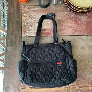 Chic Black Quilted Diaper Bag by Skip Hop